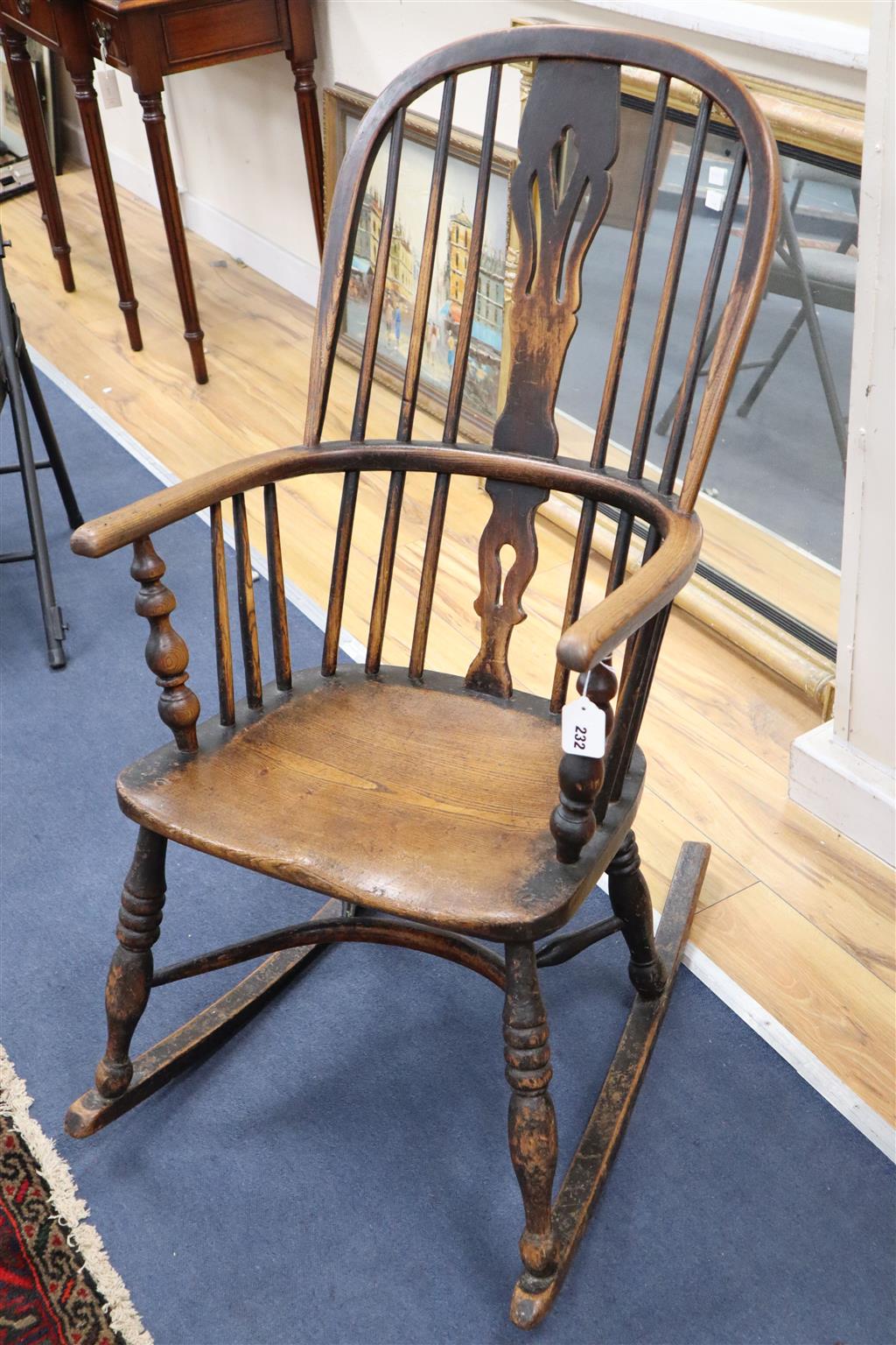 A Victorian ash and elm Windsor rocking chair